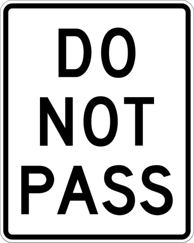 White vertical rectangular sign with black text reading DO NOT PASS.