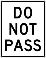 White vertical rectangular sign with black text reading DO NOT PASS.