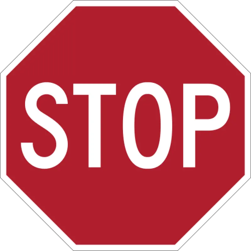 Red octagonal sign with white capital letters spelling STOP.