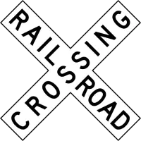 Black-and-white X-shaped crossbuck sign with the words RAILROAD CROSSING.